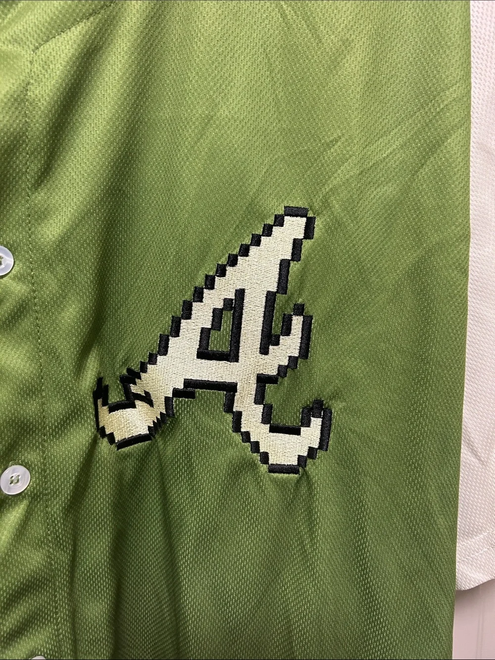 Green and White Baseball-Style Button-Up Shirt with 'A' Logo